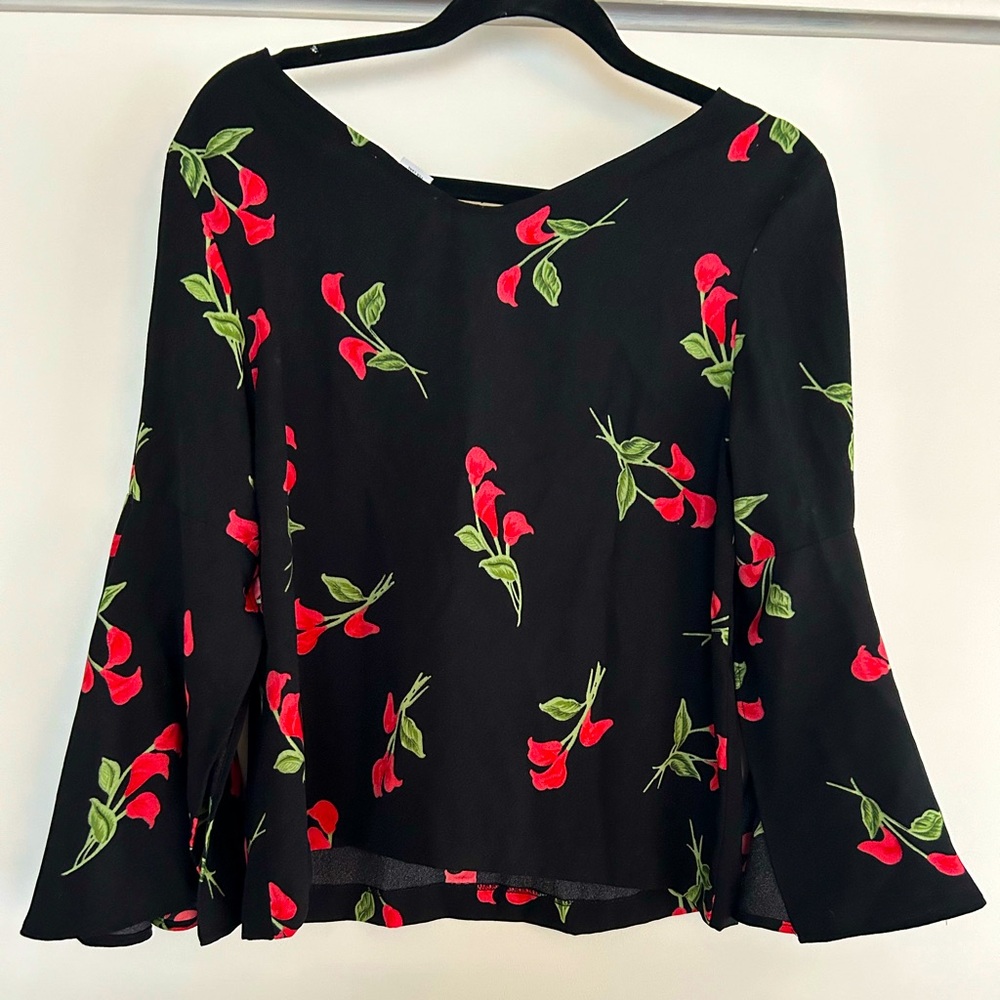 Black and pink floral blouse with bell sleeves